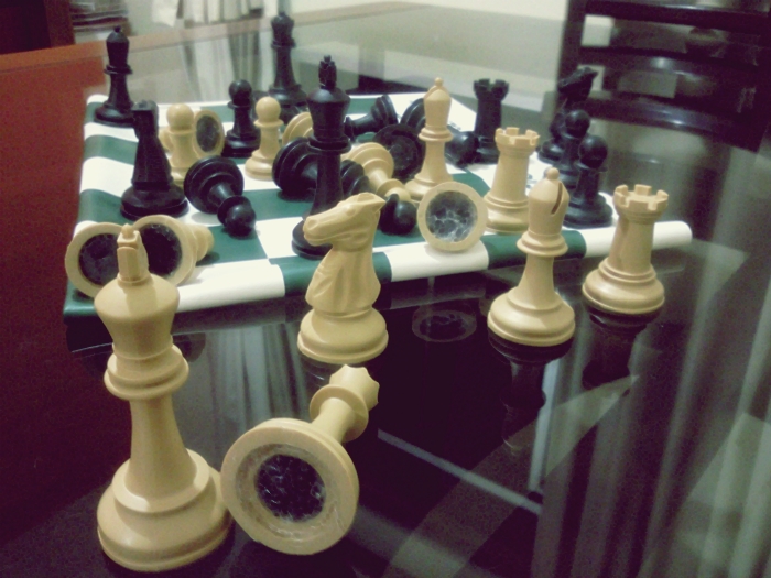 Weighted chess pieces